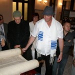 Rafael Blau explains the Torah rolls of the synagogue.