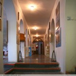 The richly decorated hallway leads to the exhibition rooms on the lower floor.